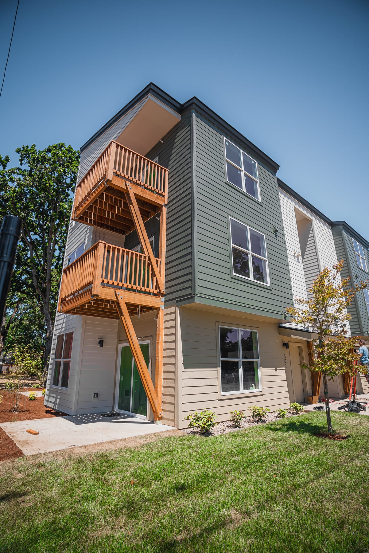 Corner elevation — three-story flats
